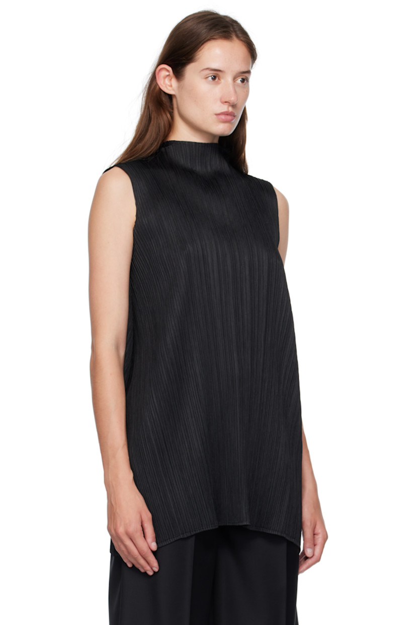 Garment-pleated tricot top. Mock neck.

Supplier color: Black