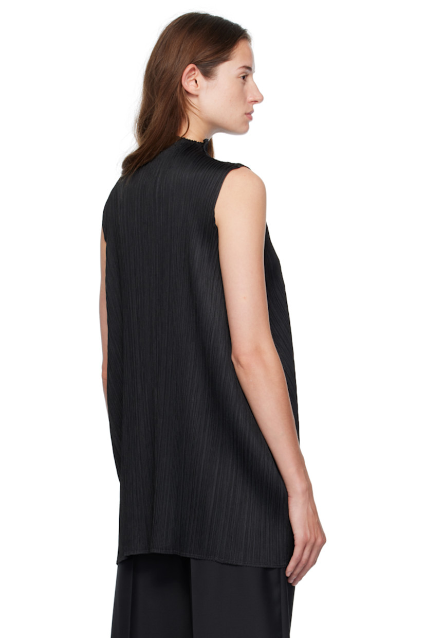 Garment-pleated tricot top. Mock neck.

Supplier color: Black