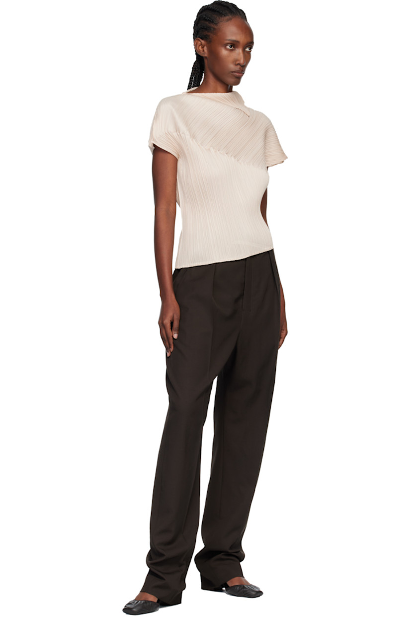 Garment-pleated tricot top.

· Boat neck
· Asymmetric cap sleeves

Supplier color: Light beige