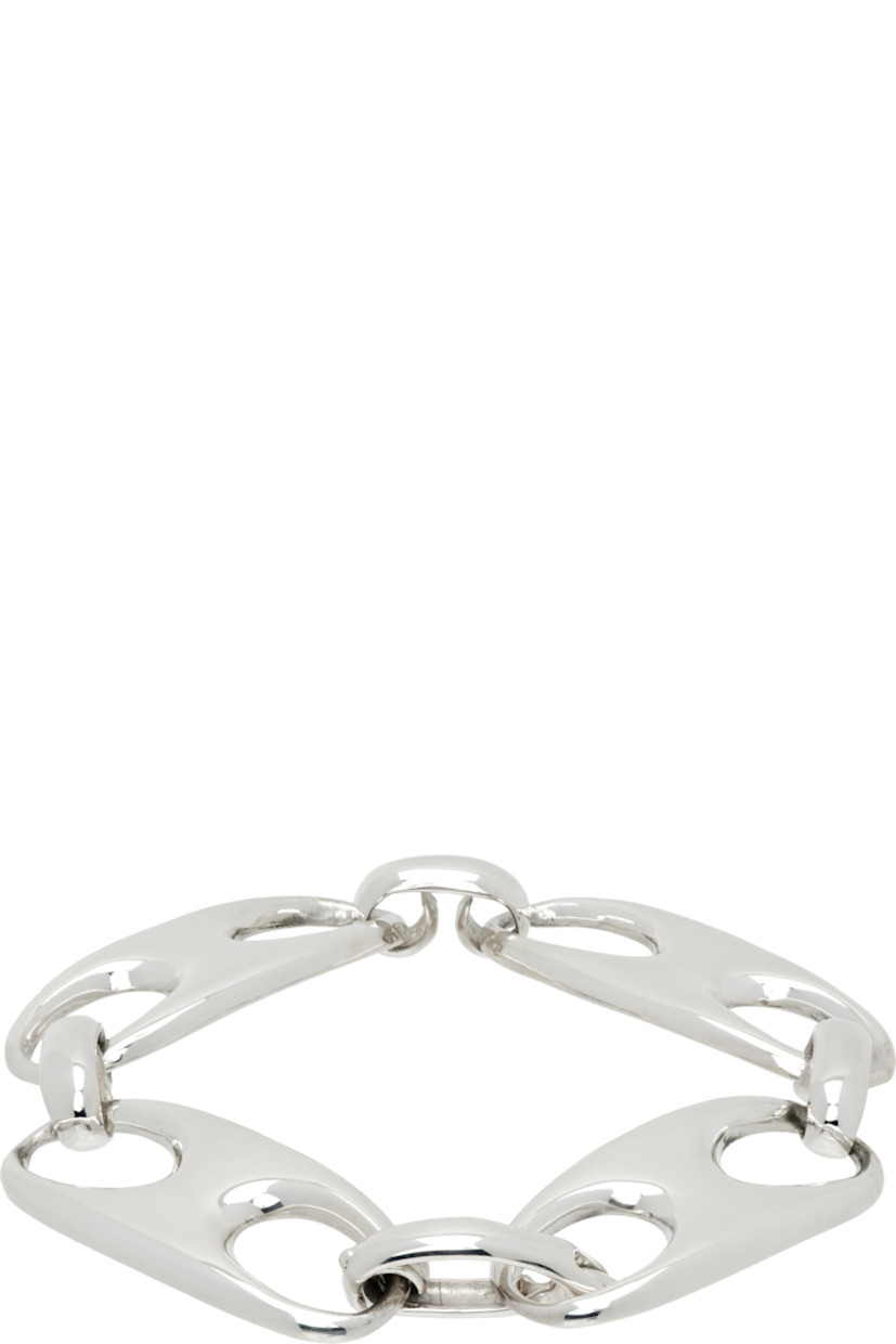 Handcrafted anchor chain bracelet in sterling silver. 

· Logo-engraved hinged-post fastening 
· L7.5"

Supplier color: Sterling silver
