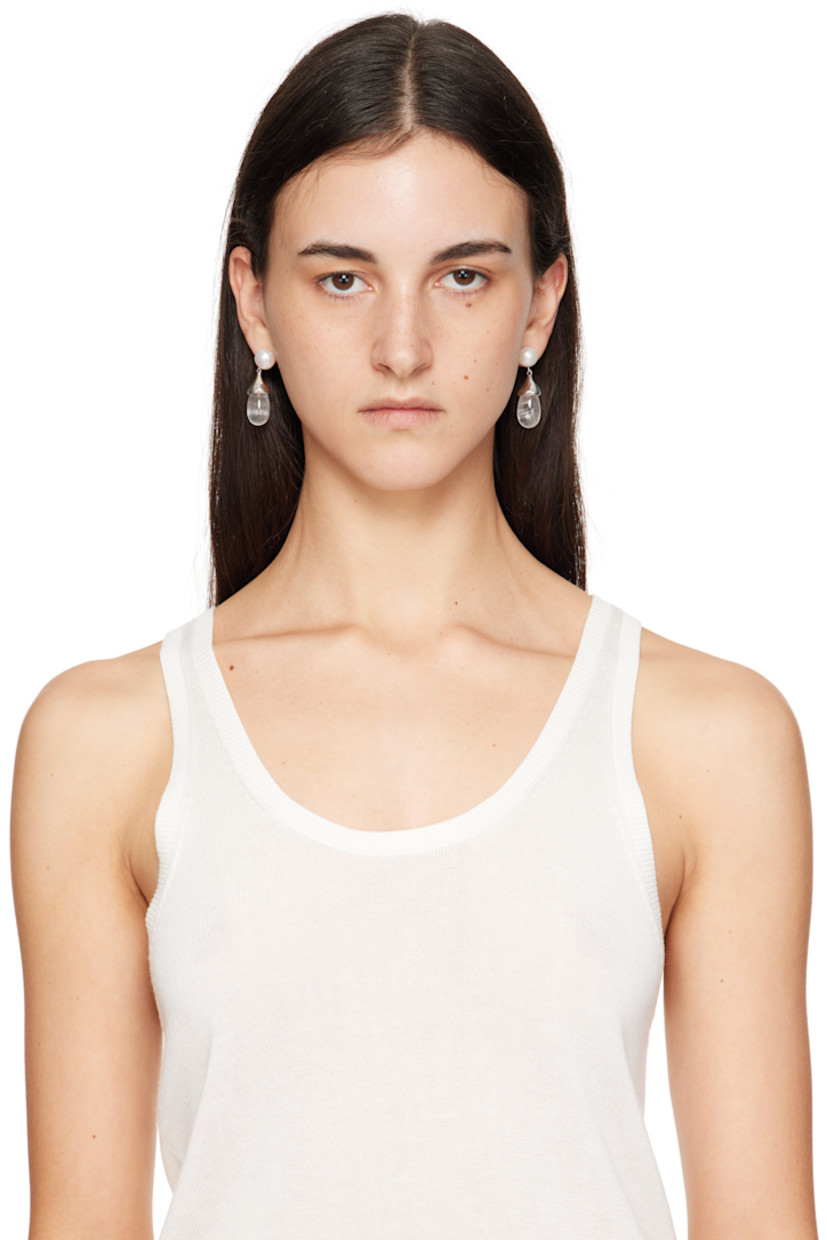 Pair of handcrafted drop earrings in sterling silver 

· Freshwater pearl at face
· Transparent quartz stone at drop
· Post-stud fastening
· H1.75" x W0.5"

Supplier color: Quartz