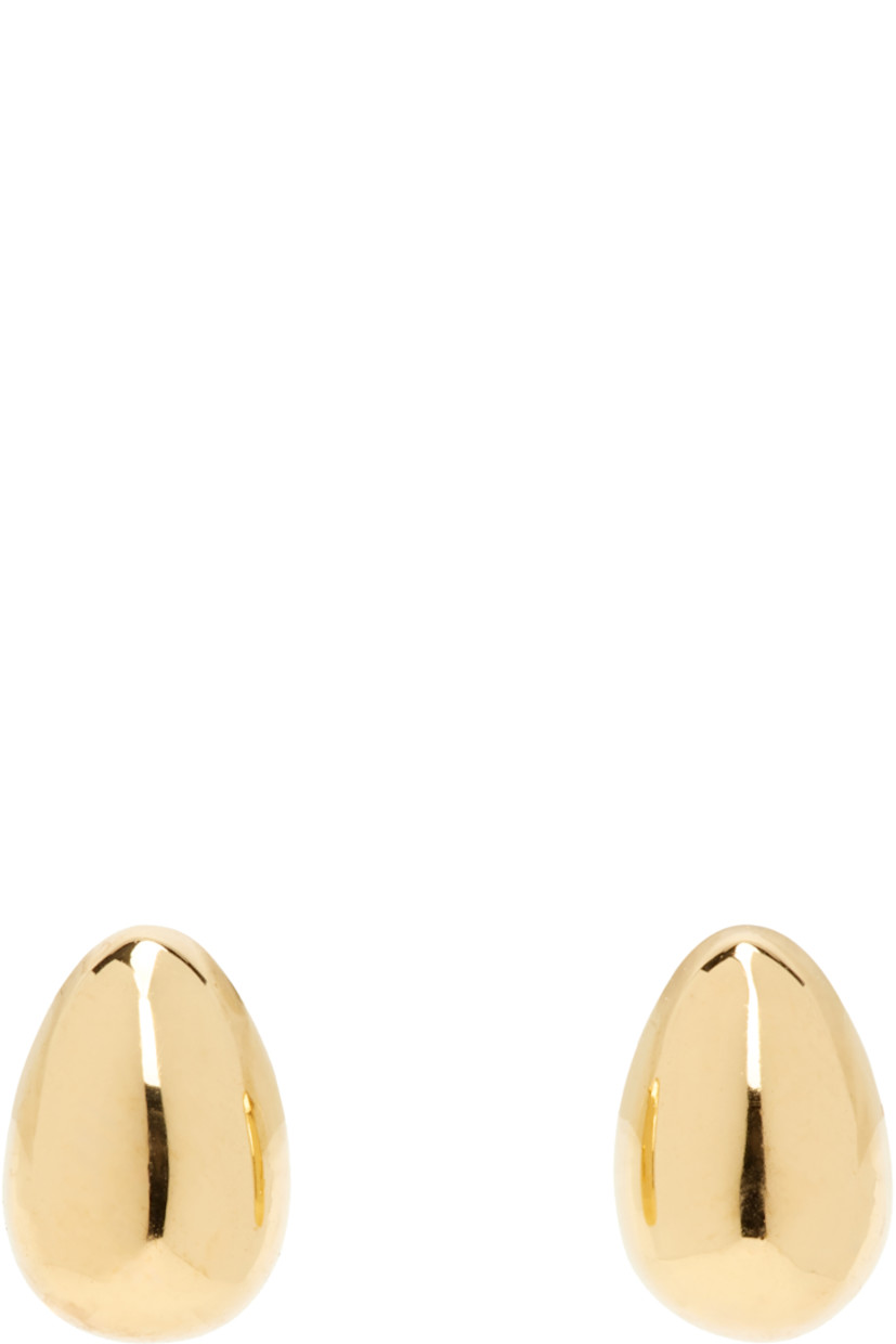 Pair of handcrafted stud earrings in 18k gold vermeil.

· Post-stud fastening
· H0.25" x W0.25"

Supplier color: 18k gold vermeil