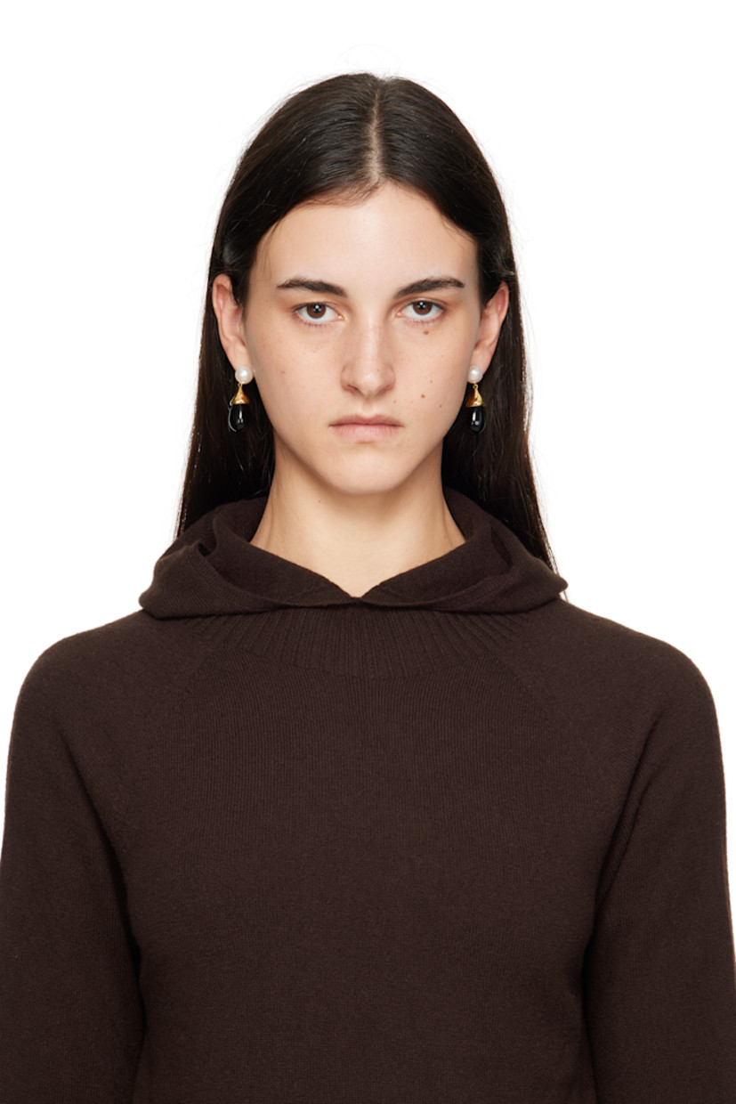 Pair of handcrafted drop earrings in 18k gold vermeil.

· Faux-pearl at face
· Black onyx stone at drop
· Post-stud fastening
· H1.75" x W0.5"

Supplier color: 18k gold vermeil