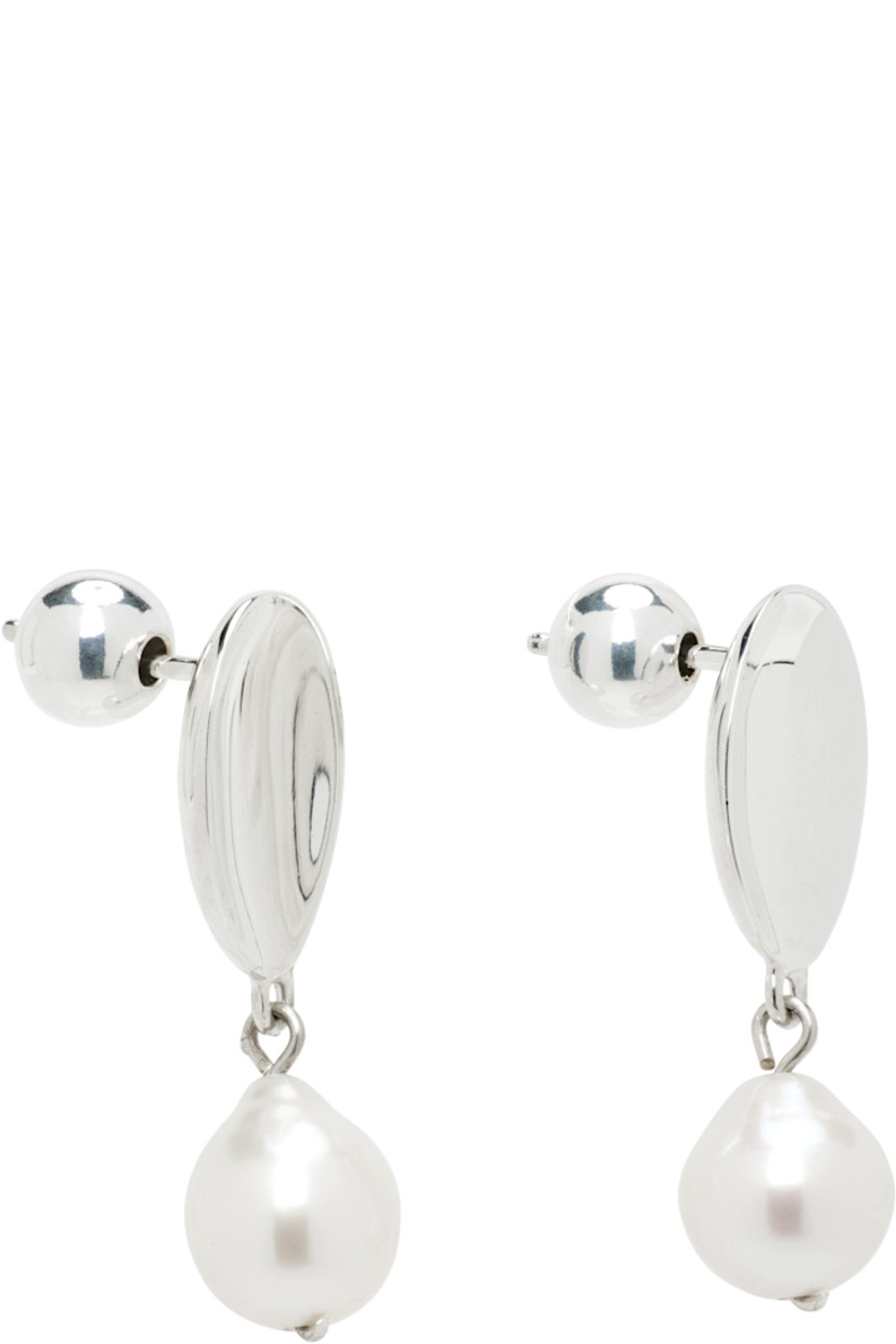 Pair of handcrafted drop earrings in sterling silver.

· Freshwater pearl at drop
· Post-stud fastening
· H1" x W0.5"

Supplier color: Sterling silver