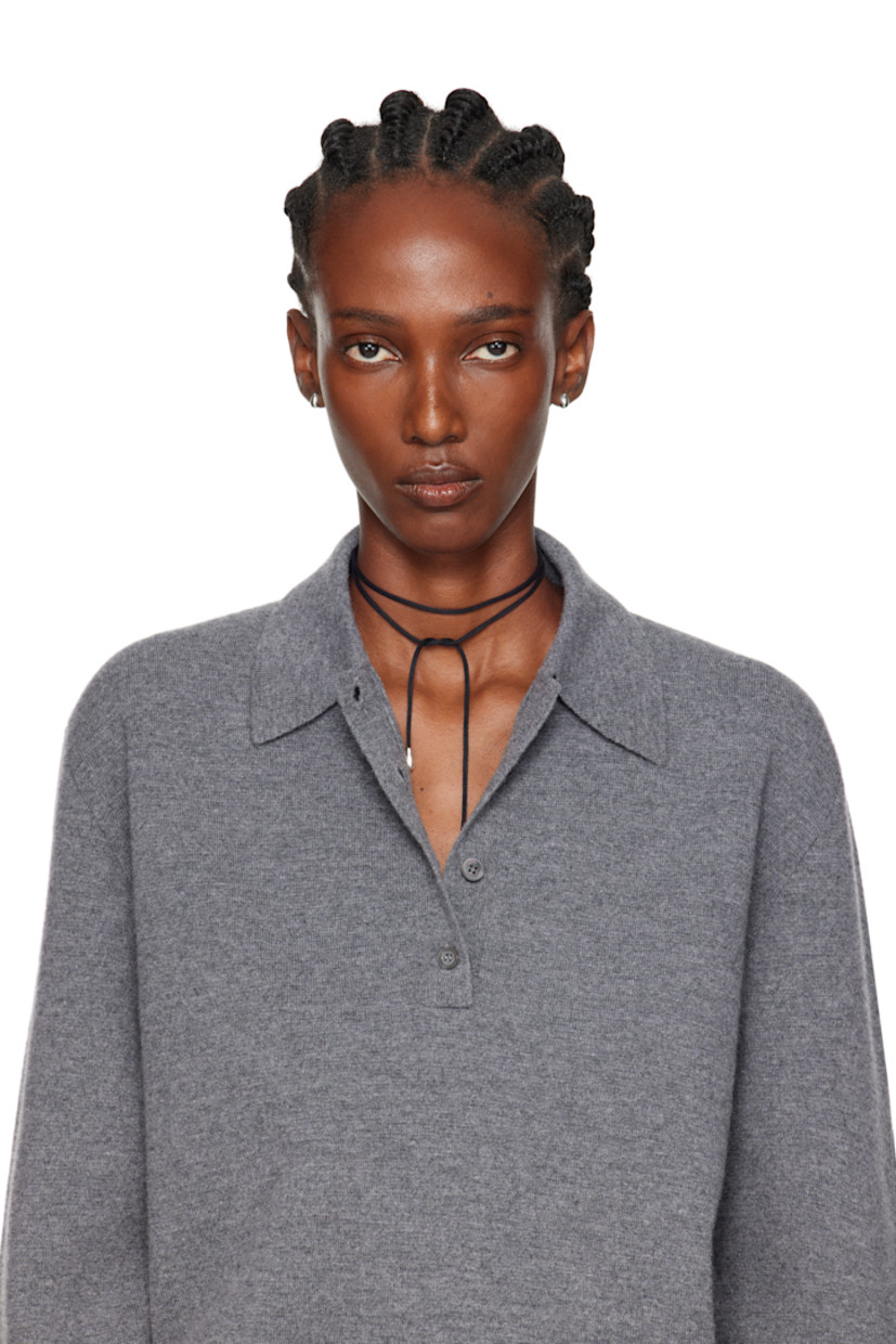 Handcrafted wraparound cotton cord choker in black.

· Sterling silver bead at ends
· Self-tie fastening
· L37.5"

Supplier color: Black