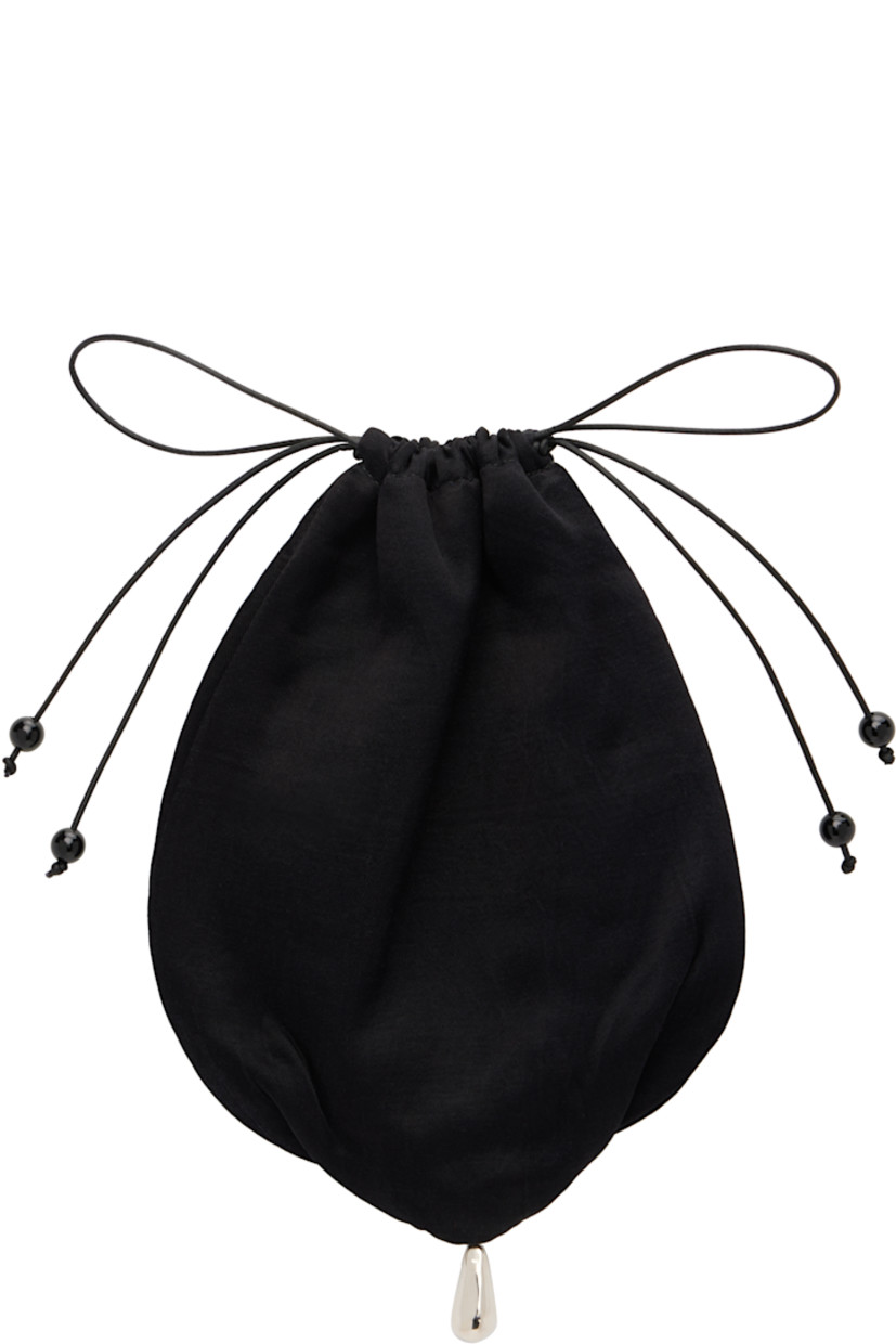 Handcrafted satin pouch.

· Sterling silver charm at drop
· Onyx beads at faux-leather drawstring closure
· H8.5" x W7"

Supplier color: Noir