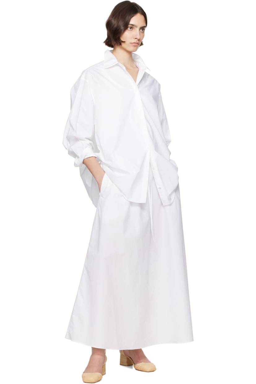 Organic cotton poplin maxi skirt. 

· Drawstring at elasticized waistband
· Two-pocket styling
· Unlined

Supplier color: White