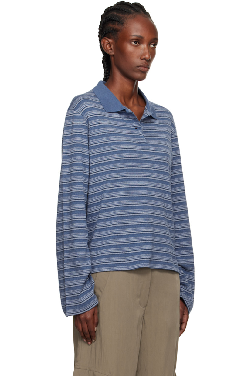 Knit organic cotton-blend polo.

· GOTS-certified organic cotton
· Stripe pattern throughout
· Rib-knit spread collar
· Two-button placket
· Dropped shoulders

Supplier color: Blue Stripe