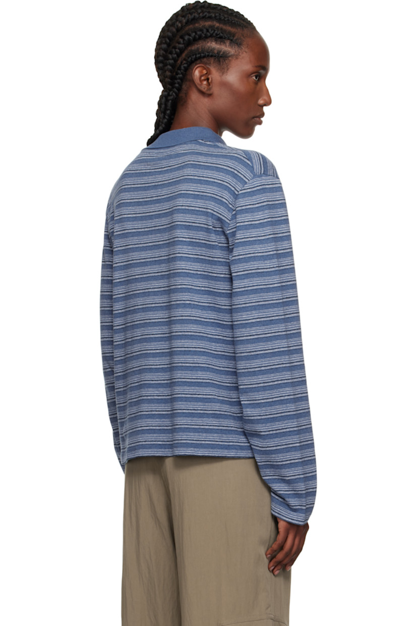 Knit organic cotton-blend polo.

· GOTS-certified organic cotton
· Stripe pattern throughout
· Rib-knit spread collar
· Two-button placket
· Dropped shoulders

Supplier color: Blue Stripe