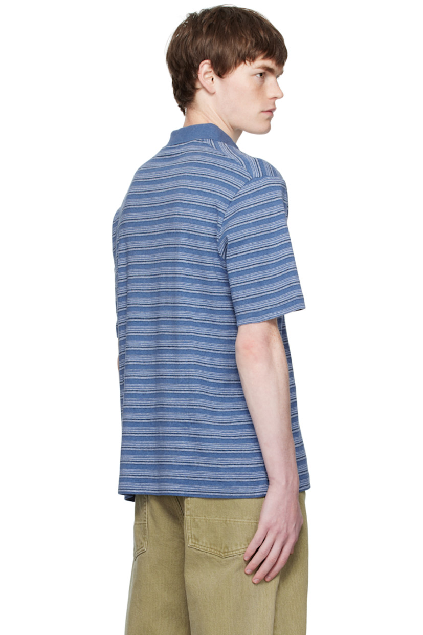 Cotton piqué polo.

· Stripe pattern throughout
· Rib-knit spread collar
· Two-button placket
· Dropped shoulders

Supplier color: Blue Stripe