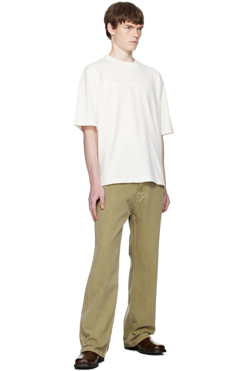 Organic cotton jersey T-shirt.

· Rib-knit crewneck
· Logo printed at chest
· Graphic printed at back

Supplier color: White