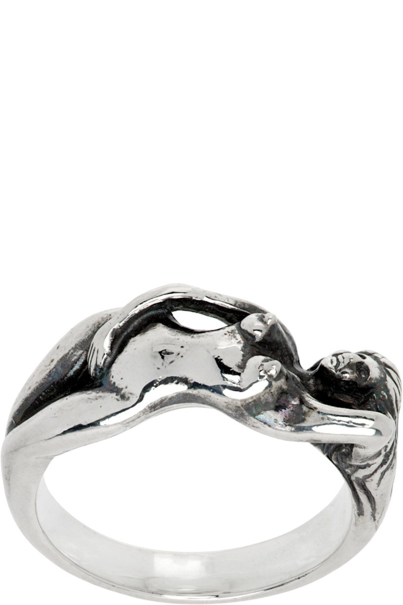 Ring in antiqued sterling silver. Graphic at face.

Supplier color: Silver