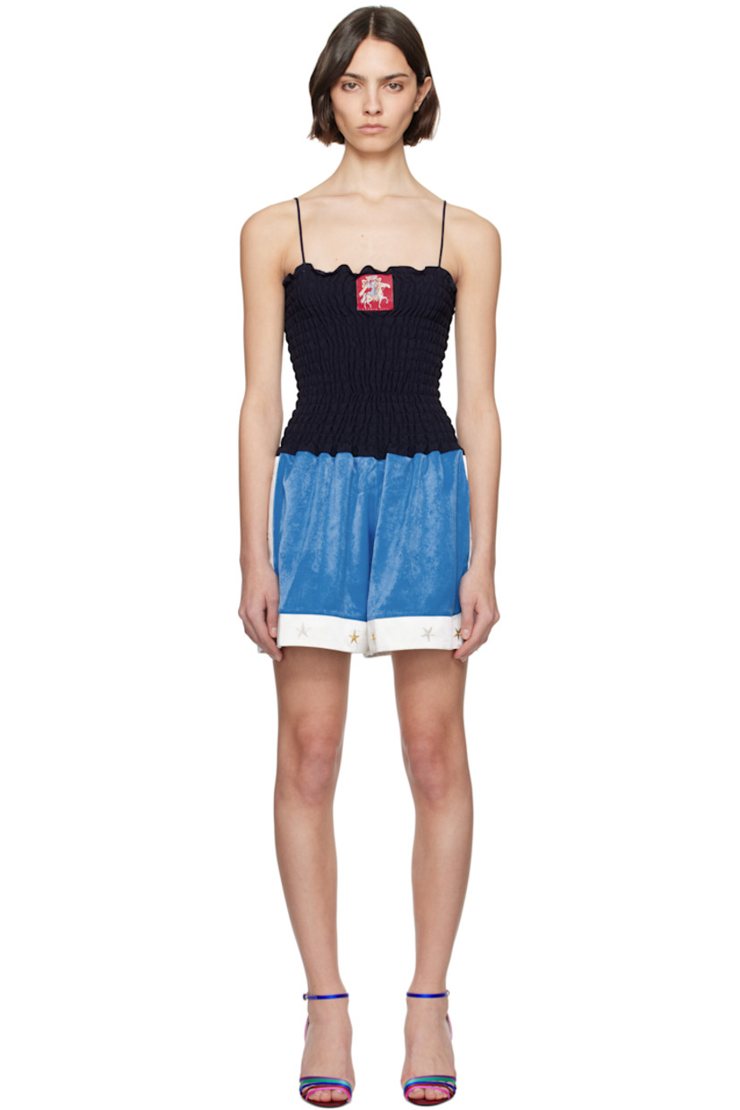 Deadstock polyester satin romper. Shirring throughout.

· Ruffled trim at square neck
· Logo patch at chest
· Fixed spaghetti straps

Supplier color: Multicolour