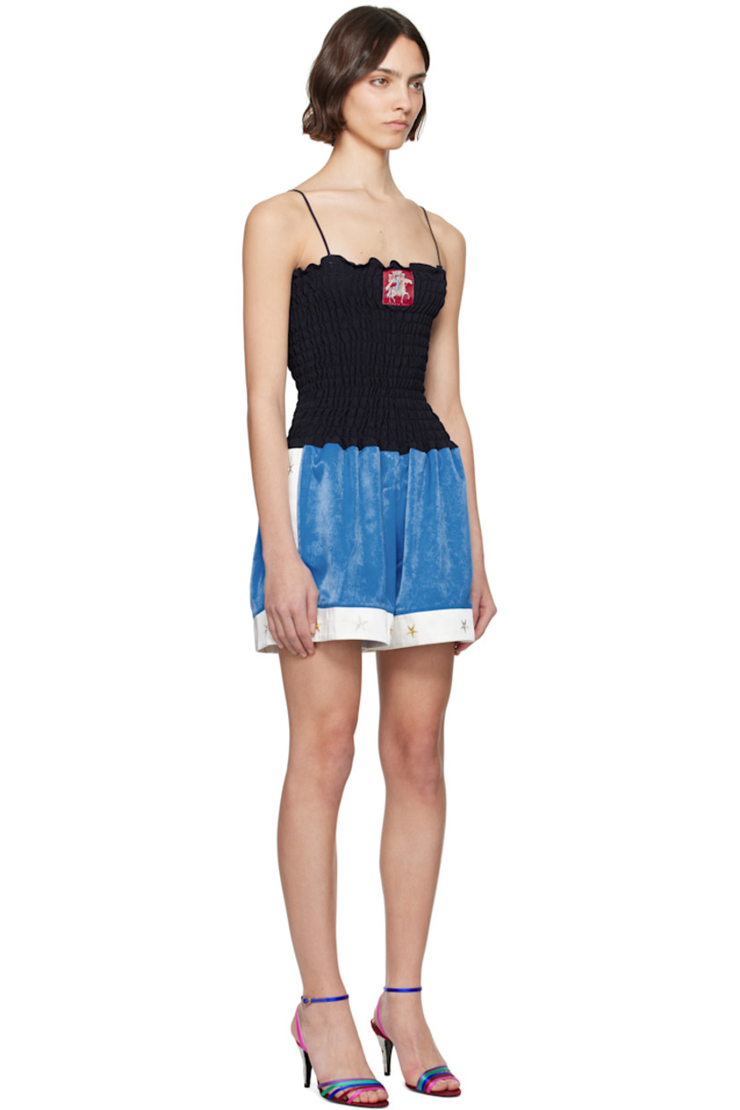 Deadstock polyester satin romper. Shirring throughout.

· Ruffled trim at square neck
· Logo patch at chest
· Fixed spaghetti straps

Supplier color: Multicolour