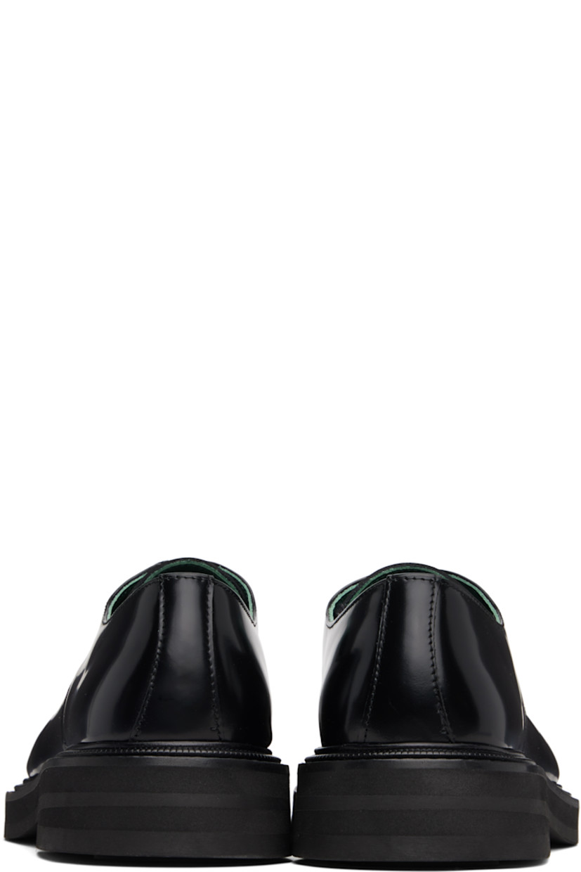 Polished leather derbys.

· Lace-up closure
· Buffed leather lining
· Topstitching at welt
· Foam rubber midsole
· Treaded rubber sole

Supplier color: Black
