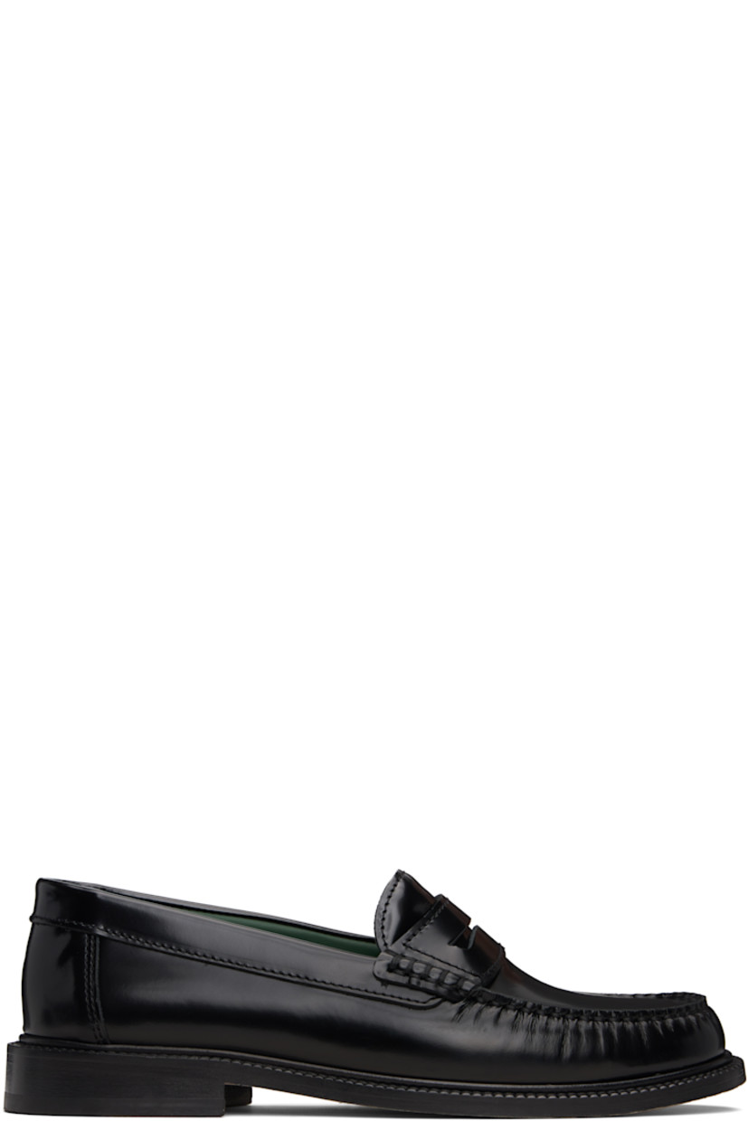 Polished leather loafers.

· Moc toe
· Strap with cutout at vamp
· Buffed leather lining
· Topstitching at welt
· Stacked leather heel with rubber injection
· Leather sole

Supplier color: Black