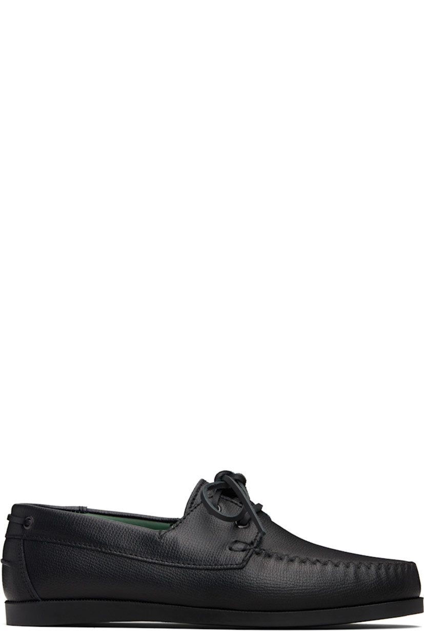 Grained leather boat shoes.

· Moc toe
· Lace-up closure
· Pinched seam at heel counter
· Buffed leather lining
· Treaded rubber sole

Supplier color: Black