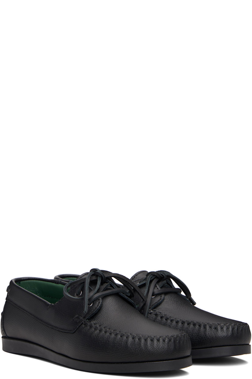 Grained leather boat shoes.

· Moc toe
· Lace-up closure
· Pinched seam at heel counter
· Buffed leather lining
· Treaded rubber sole

Supplier color: Black
