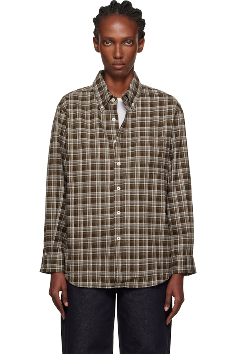 Stretch flannel shirt.

· Check pattern throughout
· Button-down spread collar
· Button closure
· Logo embroidered at patch pocket
· Shirttail hem
· Adjustable buttoned barrel cuffs
· Box pleat at back yoke

Supplier color: Brown check