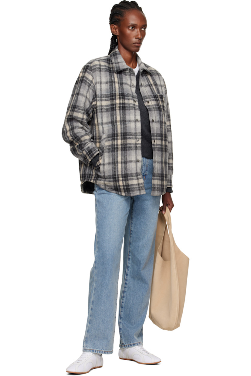 Insulated flannel overshirt.

· Check pattern throughout
· Spread collar
· Press-stud closure
· Patch pockets at chest
· Logo patch at pocket
· Welt pockets at waist
· Shirttail hem
· Press-stud barrel cuffs
· Logo embroidered at back collar
· Welt pocket at interior
· Full quilted satin lining

Supplier color: Grey check