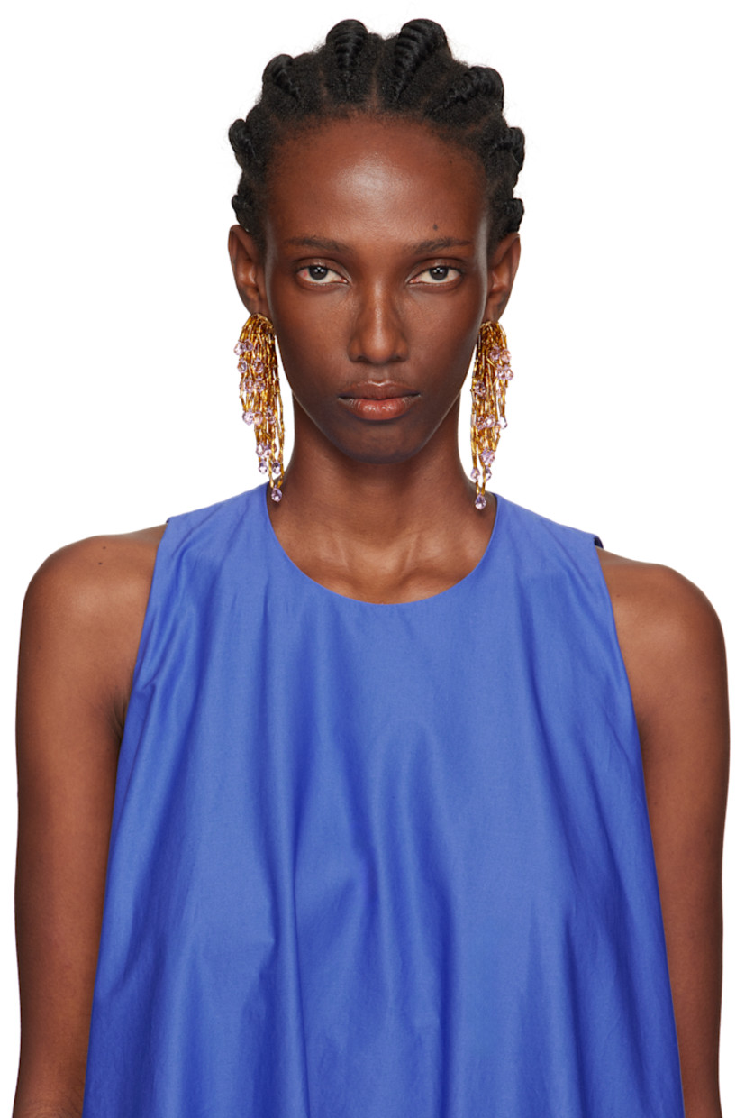 Pair of drop earrings in gold-tone brass.

· Beading in gold tone and pink
· Post-stud fastening
· H4" x W1.5"

Supplier color: Gold/Light rose