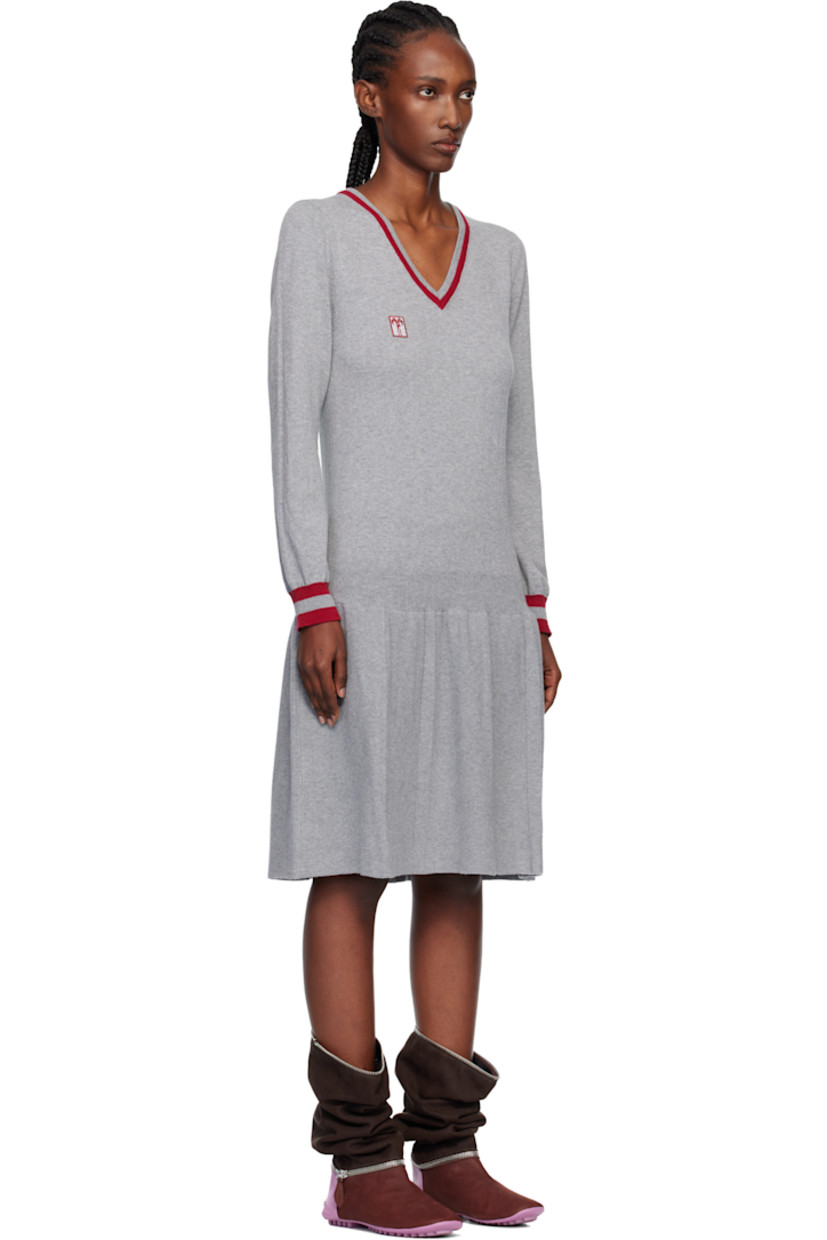 Knit and rib-knit cotton midi dress..

· Jacquard stripes at V-neck, hem, and cuffs
· Embroidered logo patch at chest
· Dropped waist 
· Pleats at hem 

Supplier color: London fog