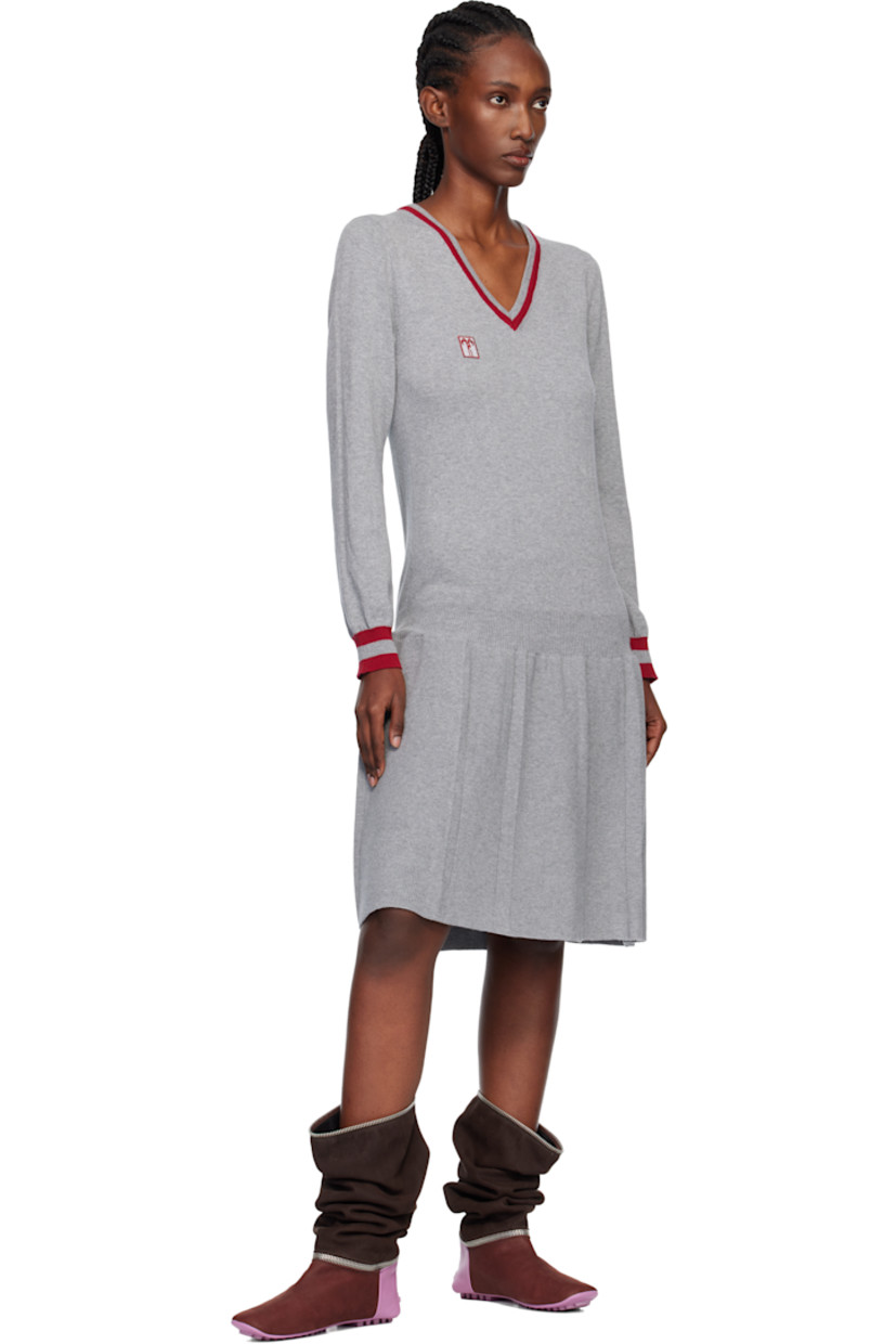 Knit and rib-knit cotton midi dress..

· Jacquard stripes at V-neck, hem, and cuffs
· Embroidered logo patch at chest
· Dropped waist 
· Pleats at hem 

Supplier color: London fog