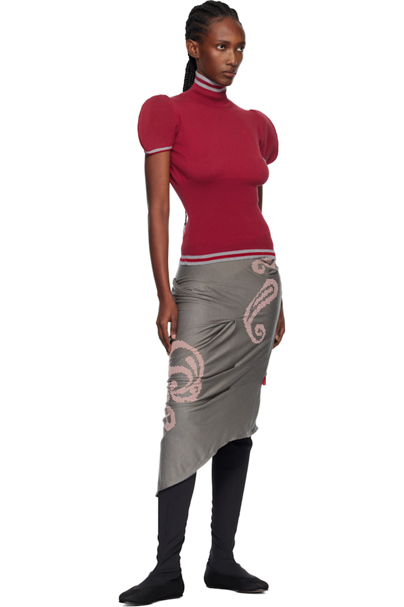 Knit and rib-knit cotton turtleneck.

· Jacquard stripes at collar, hem, and cuffs
· Structured cap sleeves

Supplier color: Cherry red