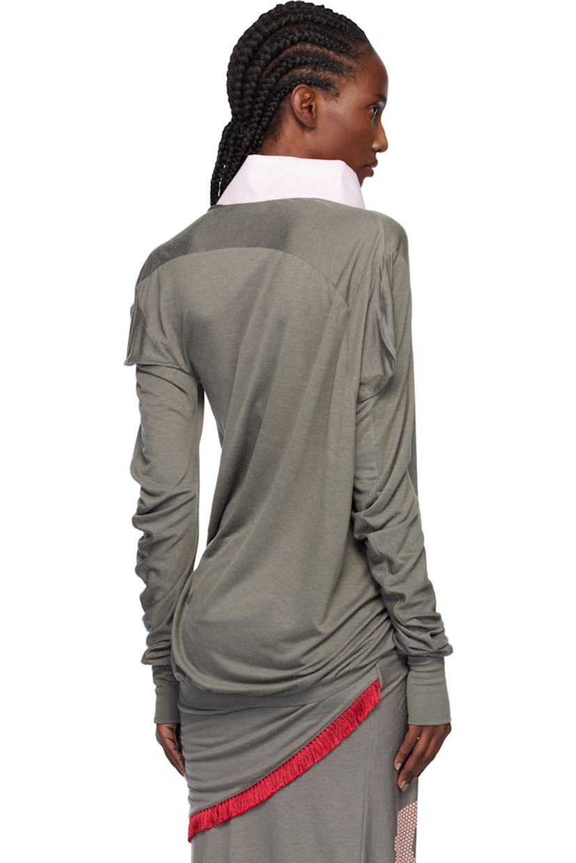Lyocell- and silk-blend slub jersey top.

· Twisted construction 
· Round neck
· Eight-button placket 
· Rib-knit hem and cuffs

Supplier color: Gargoyle grey