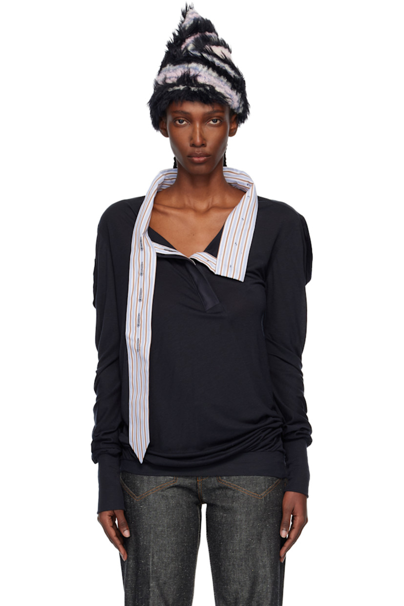 Lyocell- and silk-blend slub jersey top.

· Twisted construction 
· Round neck
· Eight-button placket 
· Rib-knit hem and cuffs

Supplier color: Coal black