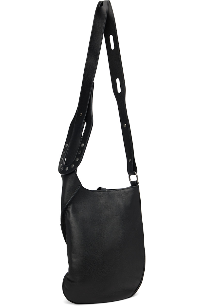 Grained nappa calfskin messenger bag.

· Clasp fastening at adjustable crossbody strap
· Pinched seam at face
· Tab-slot closure
· Zip pocket at interior
· Plain-woven lining
· H12" x W10" x D2.75"

Supplier color: Black obsidian