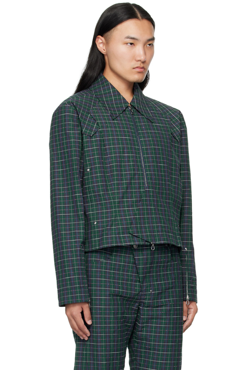 Heavyweight cotton-blend oxford cloth jacket.

· Woven check pattern throughout
· Spread collar
· Overlayed panels at front
· Two-way zip closure
· Zip pockets at waist
· Zip placket at cuffs
· Full poplin lining

Supplier color: Forest Check