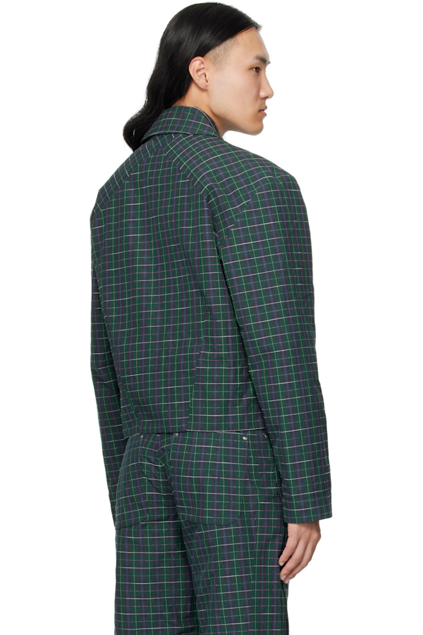 Heavyweight cotton-blend oxford cloth jacket.

· Woven check pattern throughout
· Spread collar
· Overlayed panels at front
· Two-way zip closure
· Zip pockets at waist
· Zip placket at cuffs
· Full poplin lining

Supplier color: Forest Check