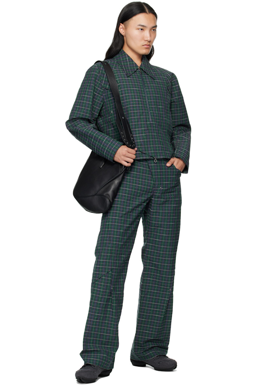 Heavyweight cotton-blend oxford cloth jacket.

· Woven check pattern throughout
· Spread collar
· Overlayed panels at front
· Two-way zip closure
· Zip pockets at waist
· Zip placket at cuffs
· Full poplin lining

Supplier color: Forest Check