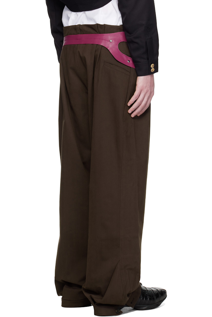 Stretch cotton- and tencel-blend herringbone trousers.

· Belt loops
· Four-pocket styling
· Zip fly
· Button fastening and pleats at cuff
· Studded grained leather trim at outseams and back
· Pleats at back waist

Supplier color: Wood brown/Red wine