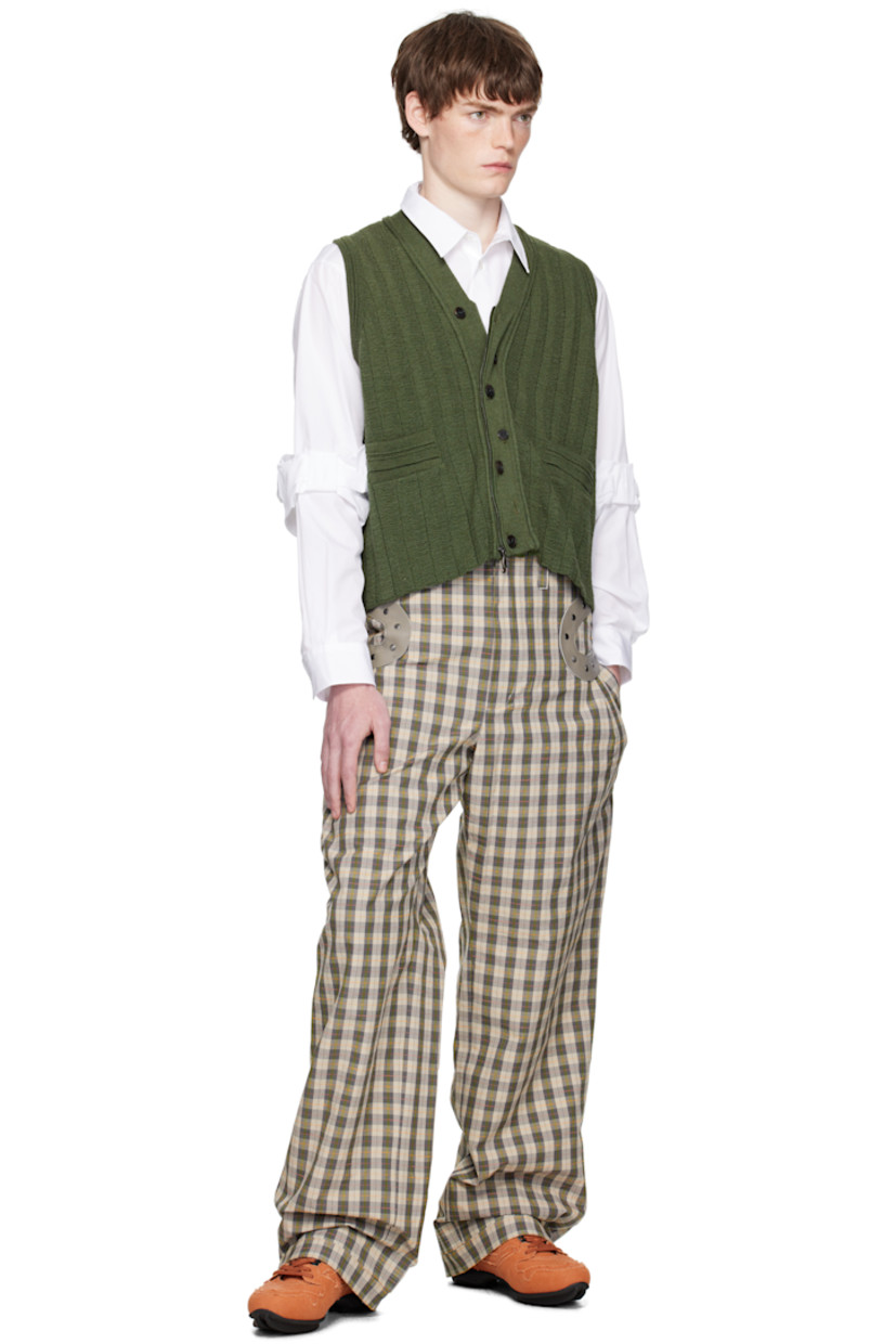 Cotton-blend oxford cloth trousers.

· Check pattern throughout
· Belt loops
· Four-pocket styling
· Zip fly
· Button fastening and pleats at cuff
· Studded grained leather trim at outseams and back
· Pleats at back waist

Supplier color: Oyster check/taupe