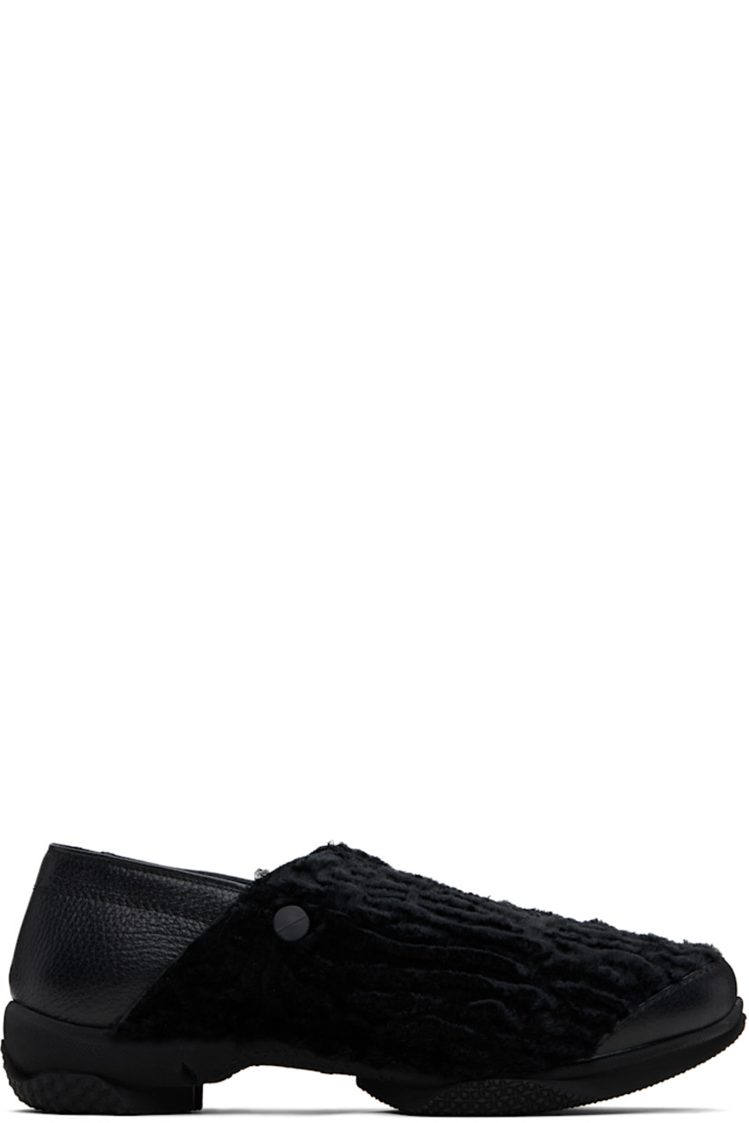 Faux-fur and pebble-grained leather loafers.

· Blanket stitching at vamp
· Logo hardware at outer side
· Concealed elasticized gusset at inner side
· Collapsible heel counter
· Buffed leather lining
· Treaded rubber sole

Supplier color: Astrakan black