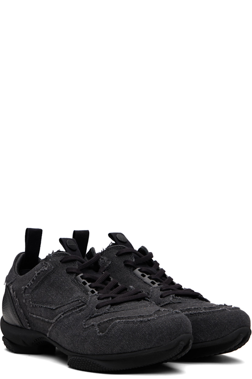 Low-top cotton canvas sneakers.

· Raw edges and fading throughout
· Lace-up closure
· Pull-loop with logo hardware at tongue
· Padded tongue and collar
· Pull-loop at heel collar
· Buffed leather lining
· Treaded rubber sole

Supplier color: Carbon black