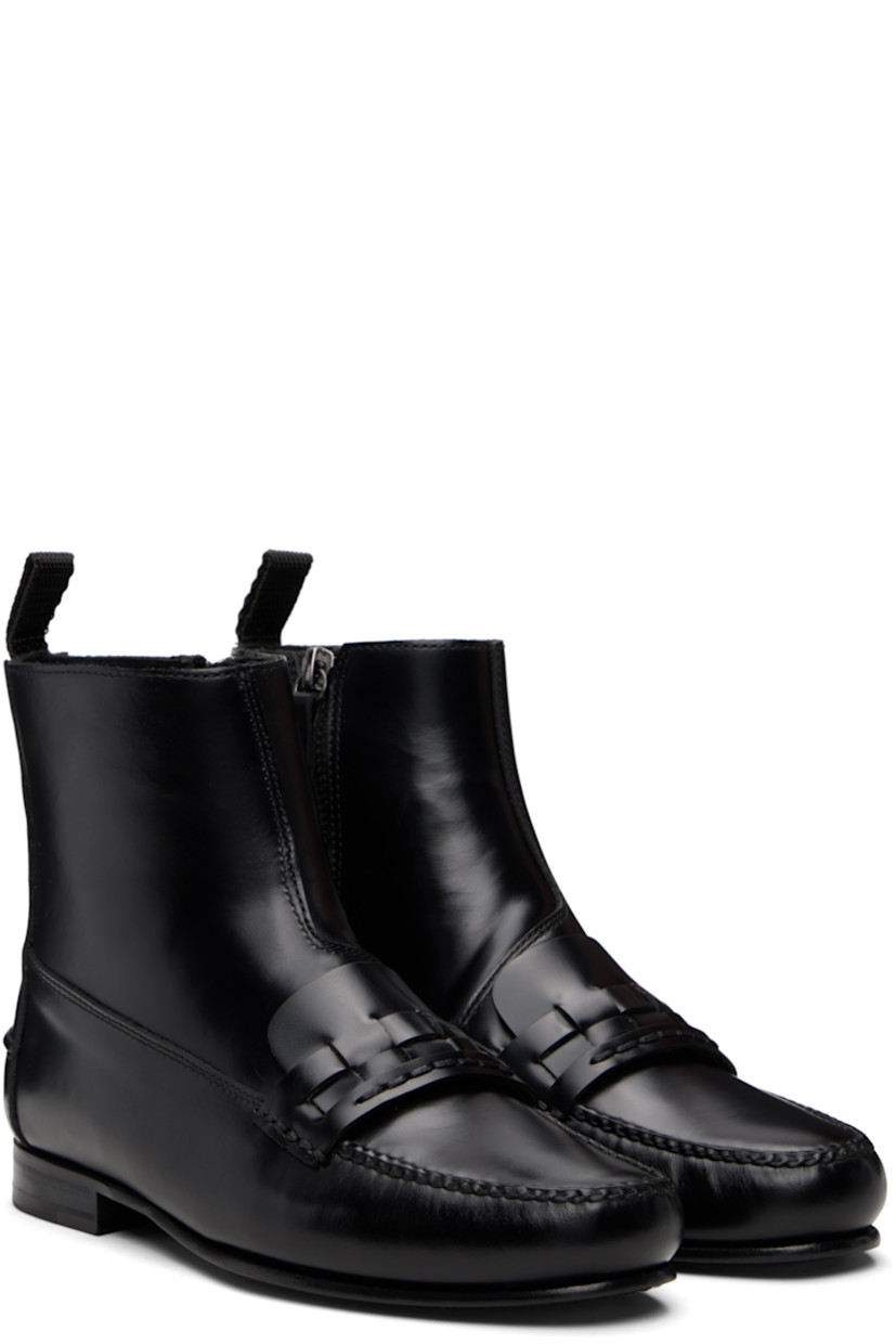 Handcrafted ankle-high buffed leather boots.

· Moc toe
· Basket-woven strap at vamp
· Zip closure at inner side
· Webbing pull-loop at heel collar
· Pinched seam at heel counter
· Stacked leather heel
· Leather sole

Supplier color: Black
