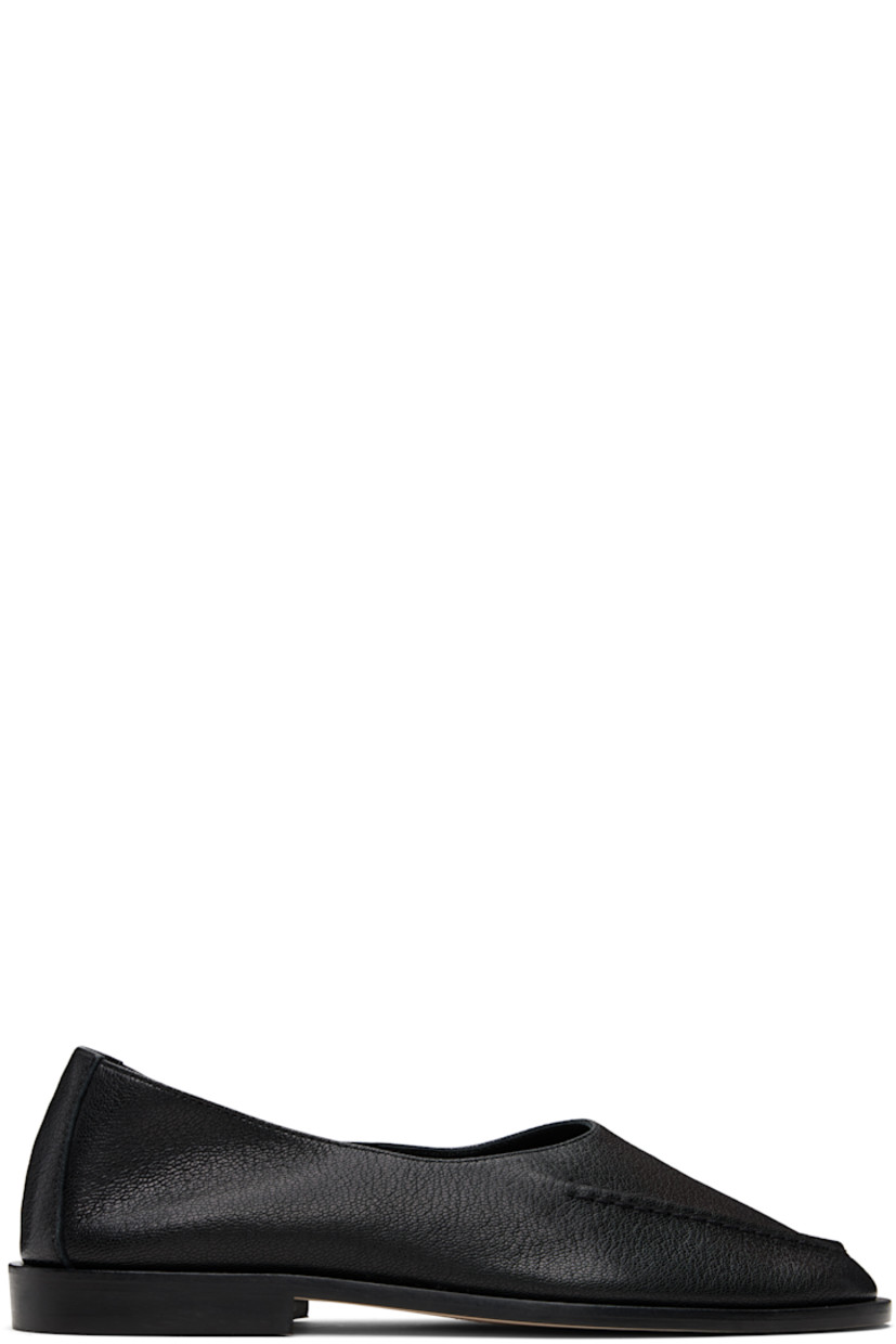 Handcrafted grained lambskin flats.

· Moc toe
· Suede interior
· Stacked calfskin heel
· Calfskin sole

Supplier color: Black