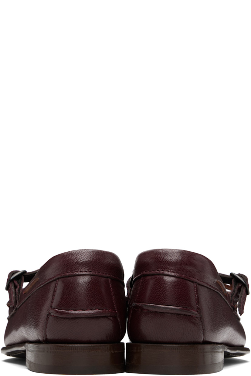 Handcrafted grained lambskin loafers.

· Moc toe
· Self-tie closure
· Pin-buckle strap at vamp
· Lace-up detailing at collar
· Pinched seam at heel counter
· Stacked calfskin heel
· Calfskin sole

Supplier color: Burgundy