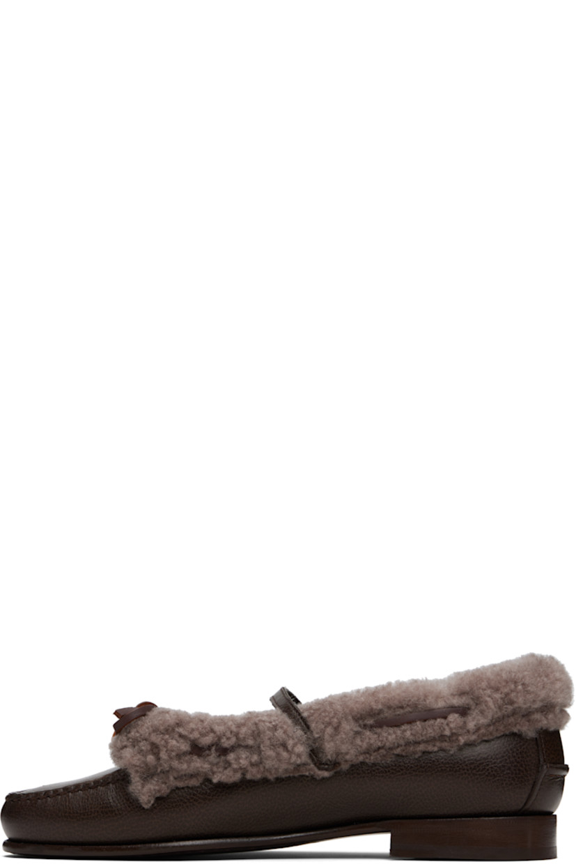 Grained calfskin and shearling loafers.

· Moc toe 
· Bow and pin-buckle strap at vamp
· Pinched seam at heel counter
· Calfskin sole with rubber injection

Supplier color: Dark brown