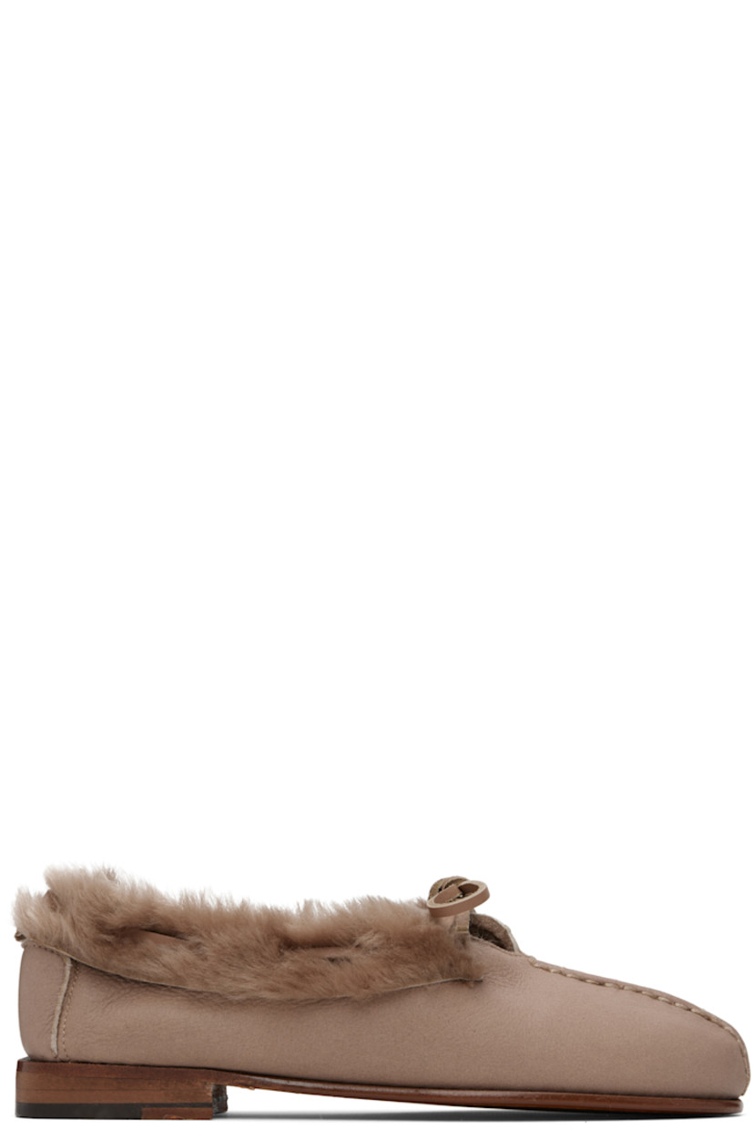 Shearling loafers.

· Topstitching and pinched seam at vamp
· Lace-up closure
· Stacked leather heel with rubber injection
· Leather sole

Supplier color: Taupe