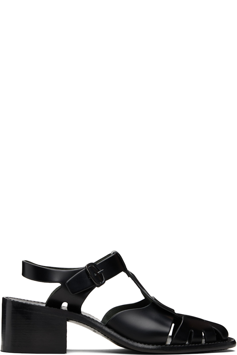 Handcrafted buffed calfskin heeled sandals.

· Cutouts throughout
· Woven detailing at vamp
· Pin-buckle ankle strap
· Logo embossed at footbed
· Stacked calfskin block heel
· Calfskin sole
· Heel: H2"

Supplier color: Black