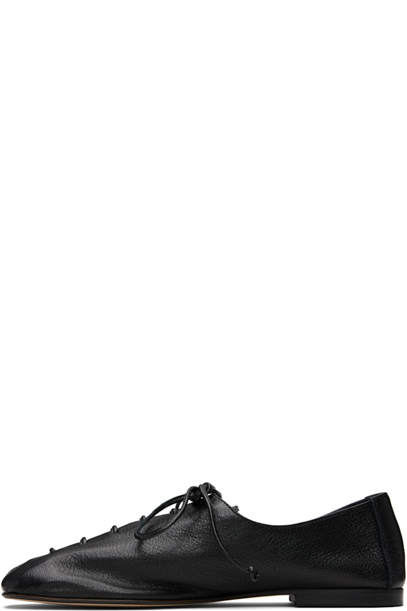 Handcrafted grained lambskin derbys.

· Square toe
· Lace-up closure
· Suede interior
· Stacked calfskin heel
· Calfskin nubuck sole

Supplier color: Black