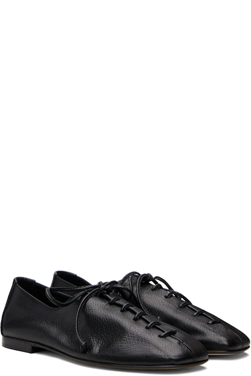 Handcrafted grained lambskin derbys.

· Square toe
· Lace-up closure
· Suede interior
· Stacked calfskin heel
· Calfskin nubuck sole

Supplier color: Black