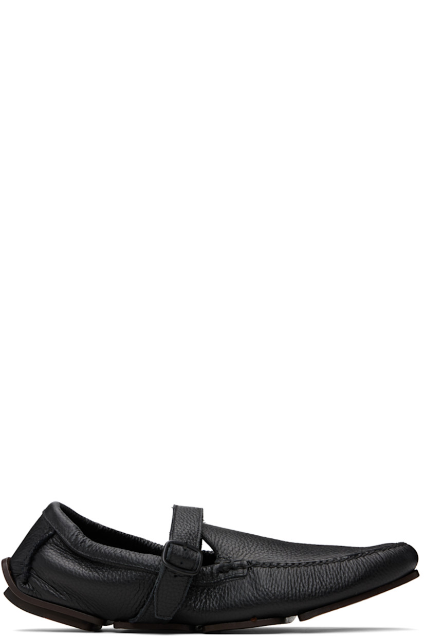 Grained leather loafers.

· Moc toe
· Pin-buckle strap at vamp
· Elasticized collar
· Buffed leather lining
· Leather sole with rubber injection

Supplier color: Black