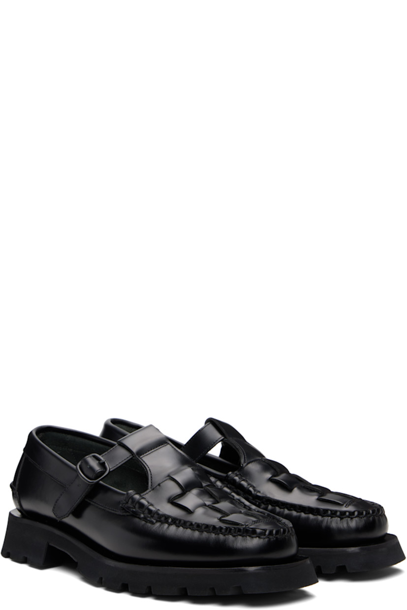 Handcrafted buffed calfskin loafers.

· Moc toe
· Woven detailing at vamp
· Pin-buckle strap
· Pinched seam at heel counter
· Suede interior
· Treaded rubber sole

Supplier color: Black