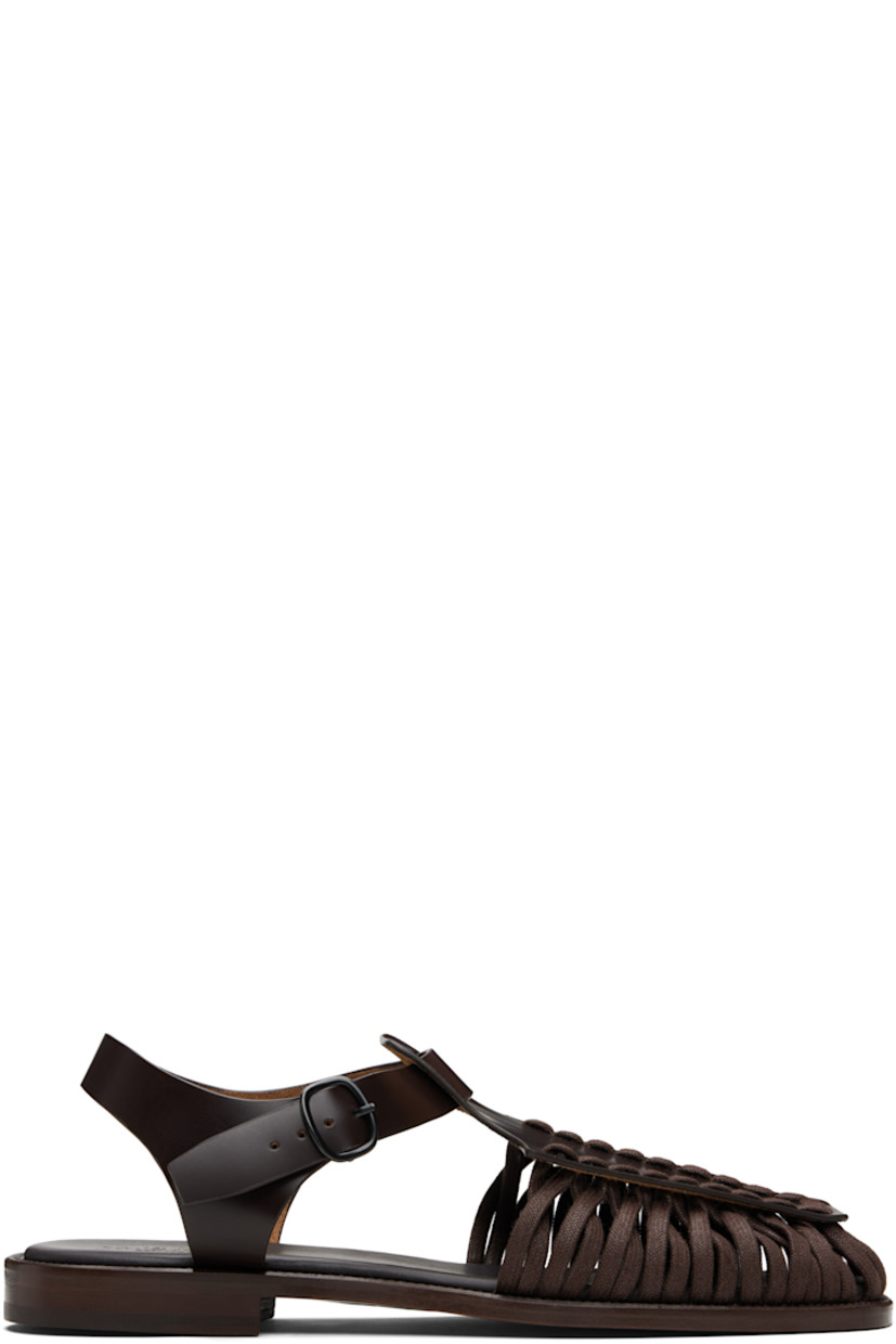 Handcrafted buffed calfskin sandals.

· Cotton lacing at square toe
· Pin-buckle ankle strap
· Logo-embossed padded calfskin footbed
· Stacked calfskin heel
· Calfskin sole

Supplier color: Dark brown