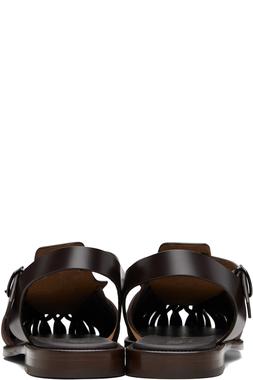 Handcrafted buffed calfskin sandals.

· Cotton lacing at square toe
· Pin-buckle ankle strap
· Logo-embossed padded calfskin footbed
· Stacked calfskin heel
· Calfskin sole

Supplier color: Dark brown